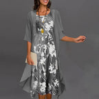 Stylish Three-Quarter Sleeve Dress Featuring an Elegant Floral Print