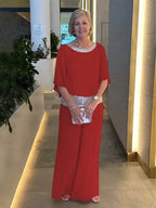 Elegant Evening Set: Glittering Top Paired with Palazzo Pants